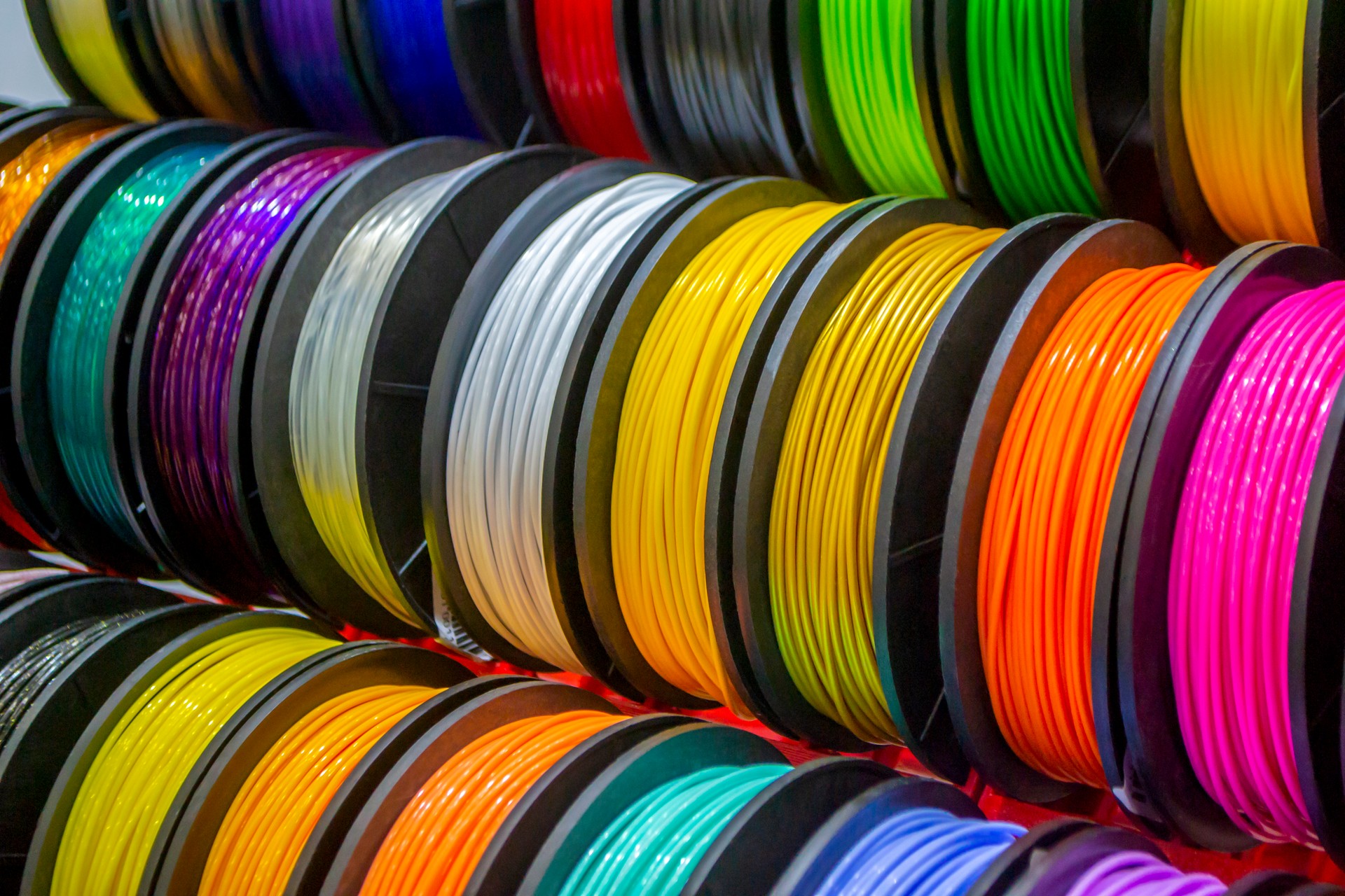 Multicolored filaments of plastic for printing on 3D printer close-up